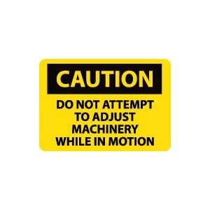 OSHA CAUTION Do Not Attempt To Adjust Machinery While. . . Safety 