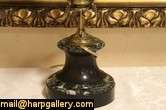pair of bronze and marble candelabra were electrified many years ago 