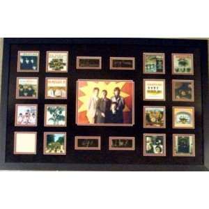 The Beatles framed and matted album cover images with Laser Signatures 