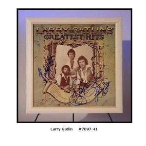  Larry Gatlin Autographed/Hand Signed Album Cover Greatest 