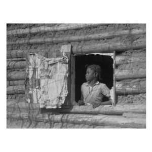 African American Girl Looking Out the Window of a Plantation Log Cabin 