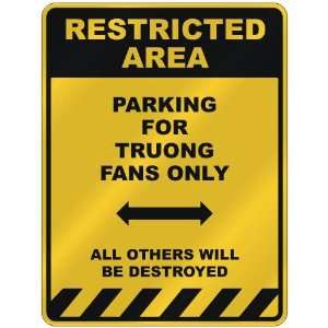  RESTRICTED AREA  PARKING FOR TRUONG FANS ONLY  PARKING 