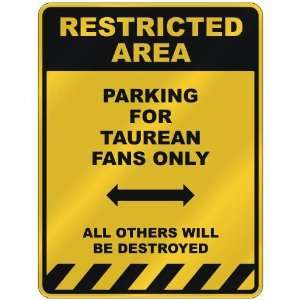  RESTRICTED AREA  PARKING FOR TAUREAN FANS ONLY  PARKING 