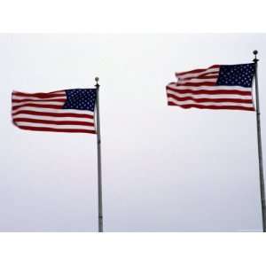  The American Flag Blows in a Stong Wind, Washington, D.C 