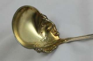   Ladles has gold wash bowl and no monogram. Great condition. Measures