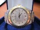 Baume Et Mecier Date Mens Watch Bezel 18k gold and Stainless Steel 