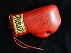 Boxing Glove signed by Muhammad Ali, Ken Norton, Larry Holmes and Joe 