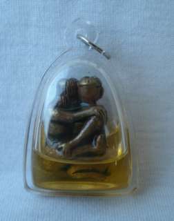   tantric love Amulet filled with magic oil and a Temple cloth  