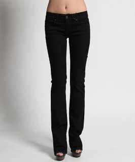 The stretch denim jean boasts a sleek low rise and narrow boot leg for 